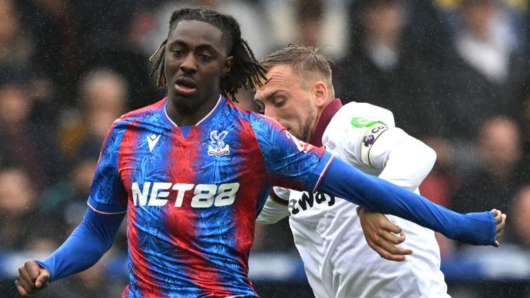 Eberechi Eze is tracked by Jarrod Bowen