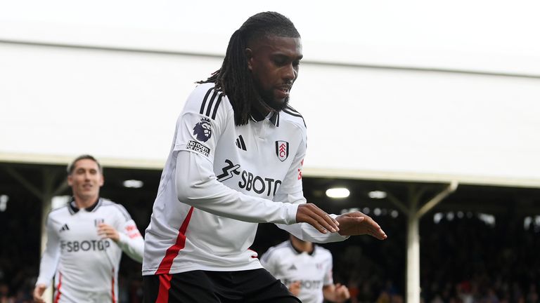 Alex Iwobi celebrates after restoring Fulham's lead against Leicester