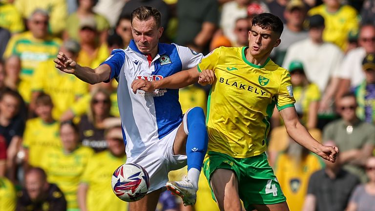 Blackburn Rovers' Ryan Hedges holds off the challenge from Norwich City's Gabriel Forsyth