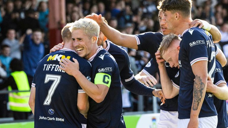 Dundee players celebrate their first-half opener