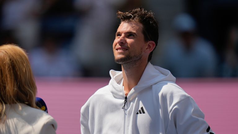 Austria's Dominic Thiem watches highlights of his game from the past few years after losing to American Ben Shelton in the first round of the U.S. Open tennis championships at the U.S. Open, Monday, Aug. 26, 2024, in New York. (AP Photo/Seth Wenig)