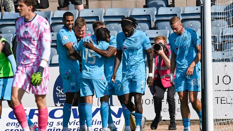 DUNDEE, SCOTLAND - AUGUST 31: St Mirren's Toyosi Olusanya celebrates with teammates after making it 1-0 during a William Hill Premiership match between Dundee and St Mirren at the Scot Foam Stadium at Dens Park, on August 31, 2024, in Dundee, Scotland. (Photo by Rob Casey / SNS Group)