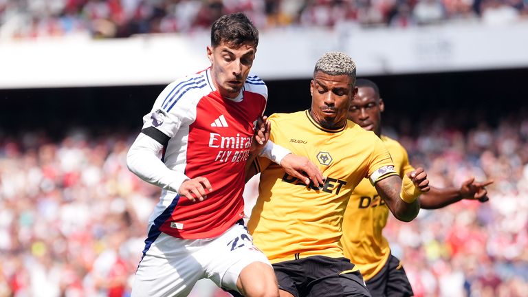 Wolves captain Mario Lemina challenges Kai Havertz of Arsenal.