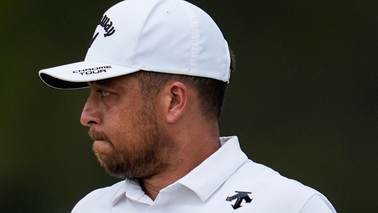 Xander Schauffele walks on the seventh green during the second round of the Tour Championship golf tournament, Friday, Aug. 30, 2024, in Atlanta. (AP Photo/Mike Stewart) 