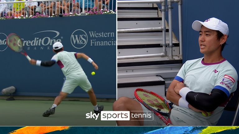 Yoshihito Nishioka receives a match penalty after being repeatedly told to calm down by the referee during his match against Hubert Hurkacz after he threw his racket and hit tennis balls into the crowd.  