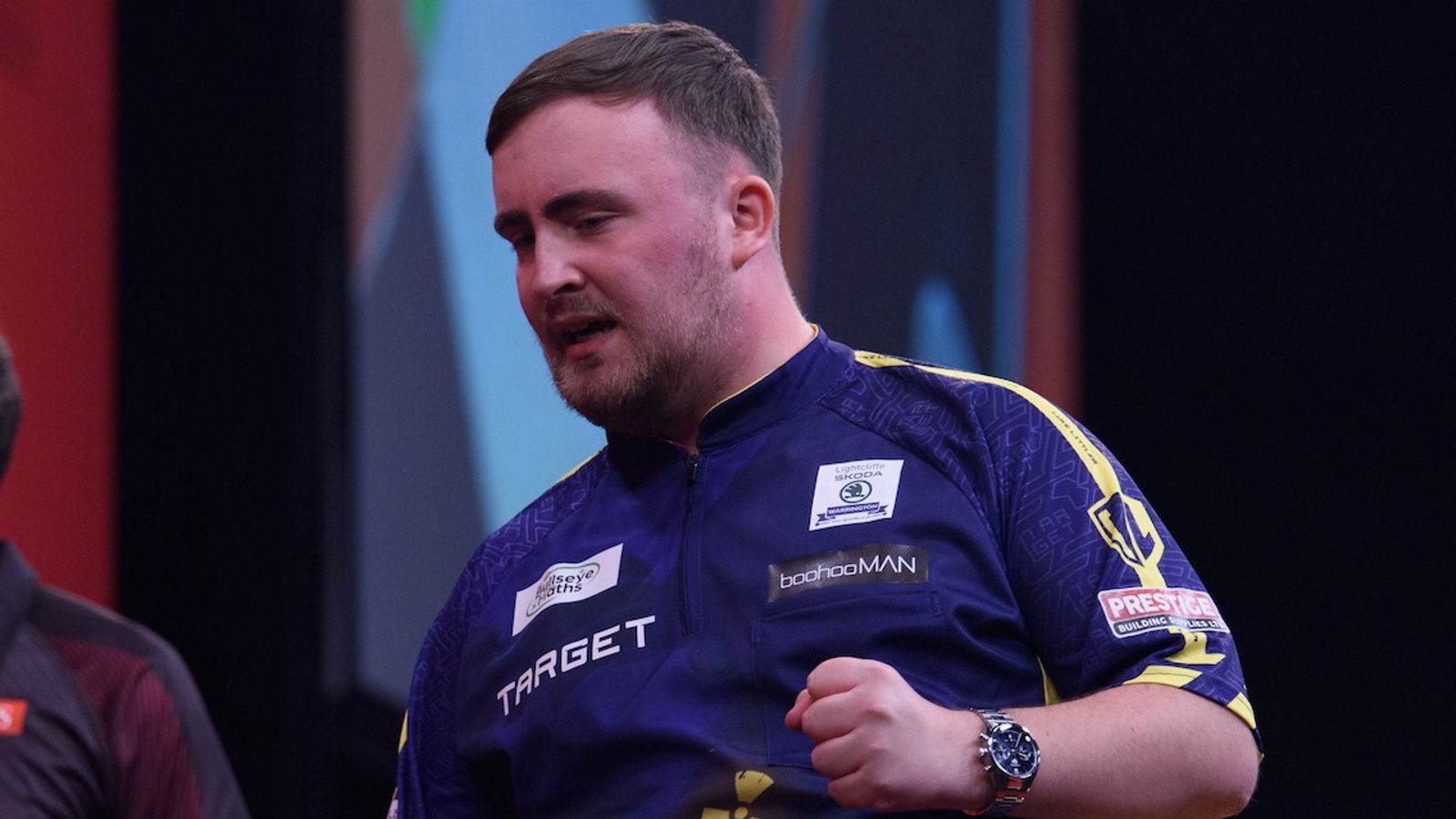 World Series of Darts: Top seed Luke Littler wins tight opener over Ross Smith in Amsterdam