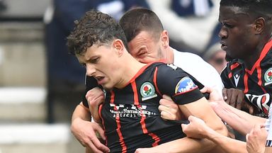 PRESTON, ENGLAND - SEPTEMBER 22: Blackburn Rovers' Owen Beck seems to be bitten on the neck by Preston North End's Milutin Osmajic during the Sky Bet Championship match between Preston North End FC and Blackburn Rovers FC at Deepdale on September 22,