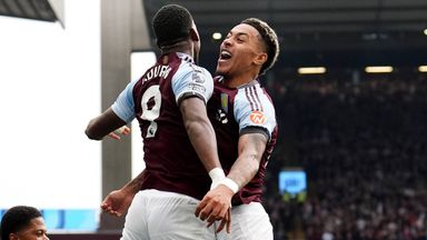 Jhon Duran chest-bumps team-mate Morgan Rogers after scoring Aston Villa's third goal against Wolves