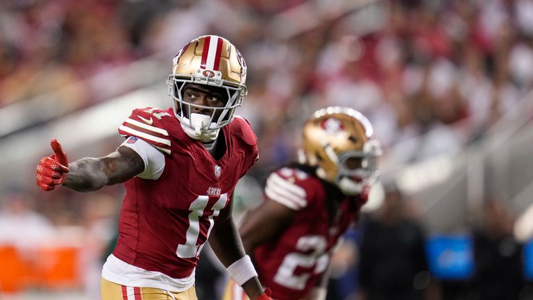 San Francisco 49ers wide receiver Brandon Aiyuk signals at the line of scrimmage during the second half of an NFL football game against the New York Jets, Monday, Sept. 9, 2024, in Santa Clara, Calif.