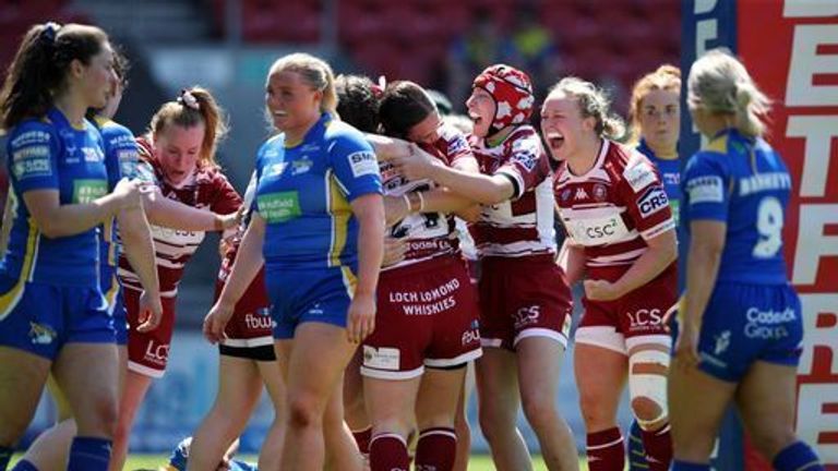 Wigan Warriors&#39; Jade Gregory-Haselden celebrates with teammates after scoring their sides third try during the Betfred Women&#39;s Challenge Cup semi-final match at the Totally Wicked Stadium, St Helens.