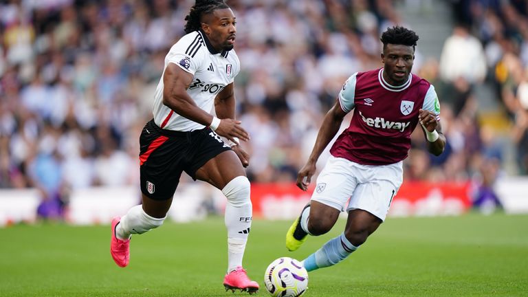 Fulham's Adama Traore (left) and West Ham United's Mohammed Kudus in action