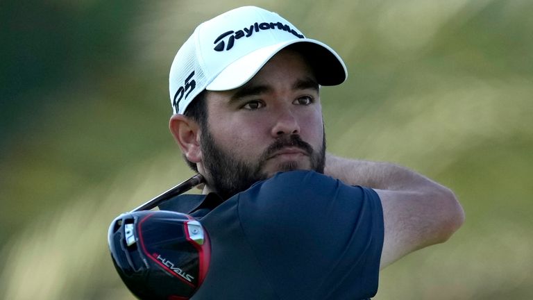 Angel Hidalgo of Spain tees off on the 12th hole during the completion of his second round on Day Three of the Dubai Desert Classic, in Dubai, United Arab Emirates, Saturday, Jan. 28, 2023. (AP Photo/Kamran Jebreili)