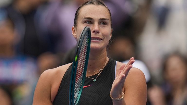 Aryna Sabalenka of Belarus reacts after defeating Ashlyn Krueger of the United States during the China Open tennis tournament held at the National Tennis Center in Beijing, Monday, Sept. 30, 2024. (AP Photo/Ng Han Guan)