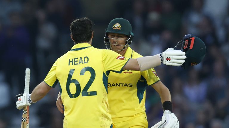 Australia's Travis Head celebrates 100 runs with batting partner Marnus Labuschagne during the first one day international match at Trent Bridge, Nottingham. Picture date: Thursday September 19, 2024.