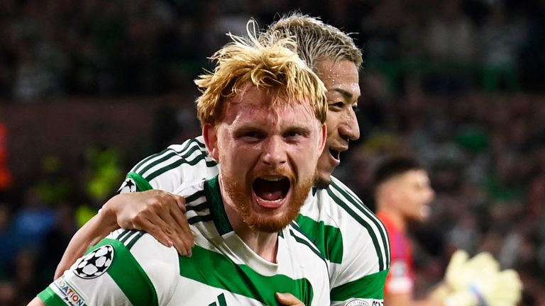 Celtic player Liam Scales celebrates scoring a goal to make it 1-0 