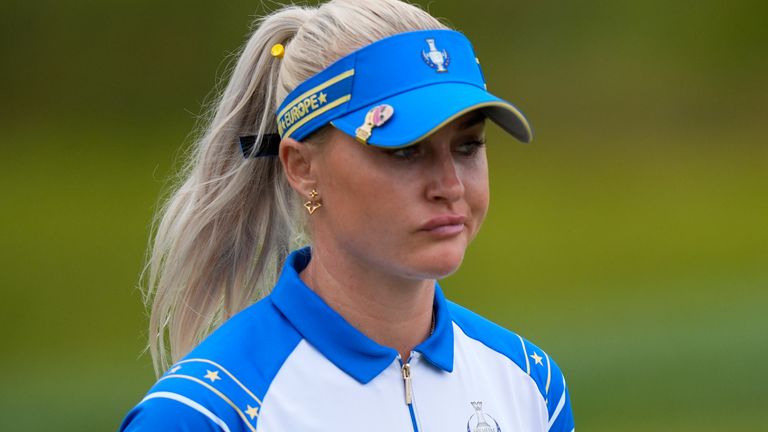 Europe's Charley Hull reacts after missing a putt on the 15th hole during a Solheim Cup golf tournament foursomes match at Robert Trent Jones Golf Club, Friday, Sept. 13, 2024, in Gainesville, Va. (AP Photo/Chris Szagolo)