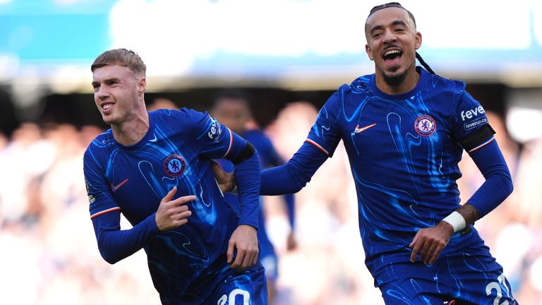 Chelsea's Cole Palmer celebrates his hat-trick goal with teammate Malo Gusto