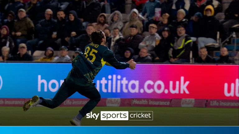 Australia's Tim David took a sensational catch as Jordan Cox departed for 17 on his England debut.