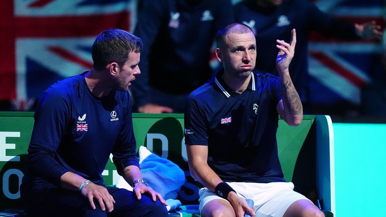 Great Britain's Dan Evans with team captain Leon Smith (left) during the Davis Cup group stage finals match at the AO Arena in Manchester (PA Images)