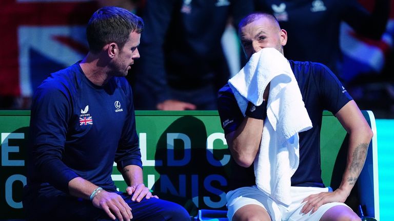 Great Britain's Dan Evans with captain Leon Smith (left) during the Davis Cup group stage finals match at the AO Arena in Manchester  (PA Images)