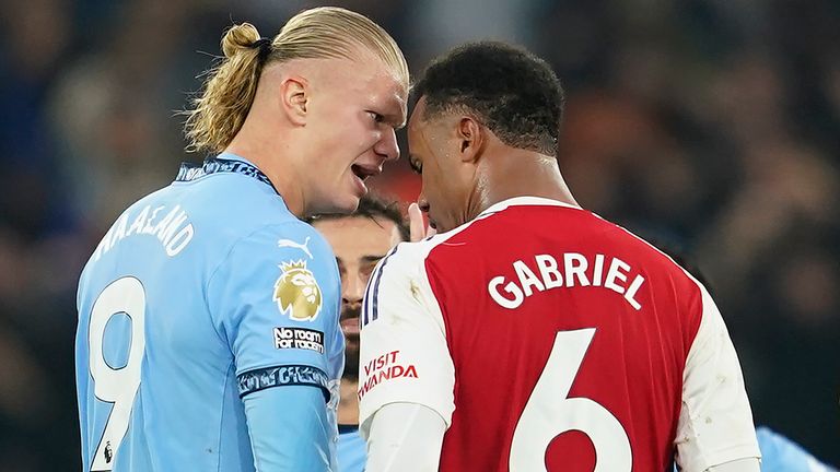 Manchester City's Erling Haaland has a disagreement with Arsenal's Gabriel during the English Premier League soccer match between Manchester City and Arsenal at the Etihad stadium in Manchester, England, Sunday, Sept. 22, 2024. (AP Photo/Dave Thompson)