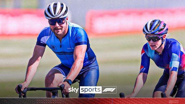 Mercedes driver Valtteri Bottas of Finland, left, and his girlfriend Tiffany Cromwell cycle along the track for the British Formula One Grand Prix at Silverstone circuit, Silverstone, England, Thursday, July 30, 2020.(AP Photo/Frank Augstein)