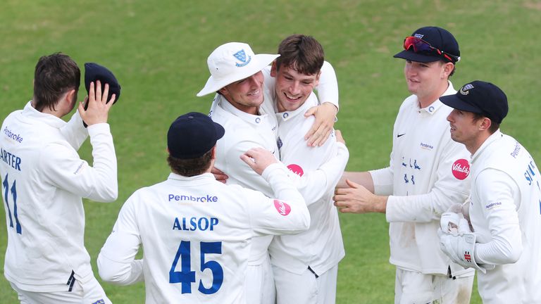 Henry Crocombe of Sussex celebrates claiming the wicket of Zafar Gohar of Gloucestershire as his side won promotion