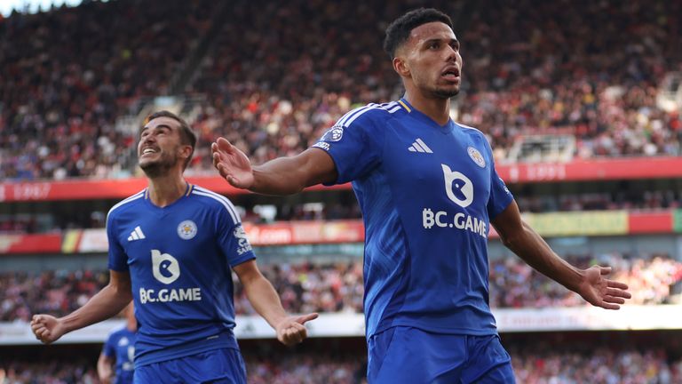 James Justin and team-mate Harry Winks celebrate as Leicester come from two goals down to make it 2-2