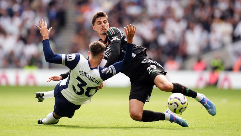 Arsenal's Kai Havertz and Tottenham Hotspur's Rodrigo Bentancur (left) battle for the ball