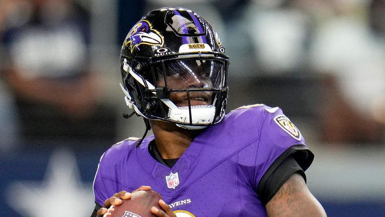 Baltimore Ravens quarterback Lamar Jackson warms up before an NFL football game against the Dallas Cowboys in Arlington, Texas, Sunday, Sept. 22, 2024. (AP Photo/Julio Cortez)