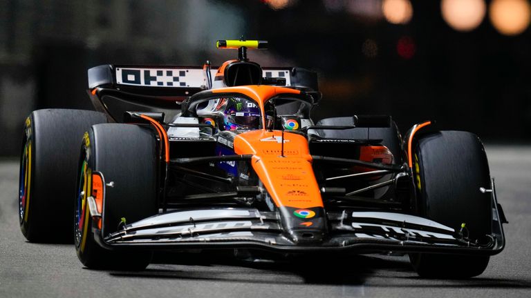 McLaren driver Lando Norris of Britain steers his car during the Singapore Formula One Grand Prix at the Marina Bay Street Circuit, in Singapore, Sunday, Sept. 22, 2024. (AP Photo/Vincent Thian)