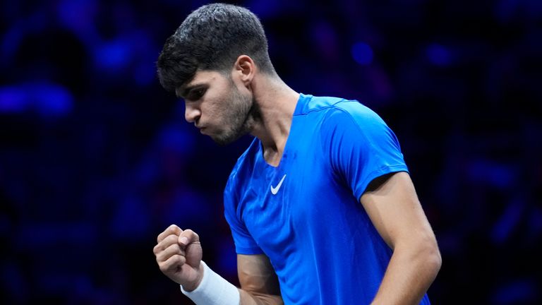 Team Europe's Carlos Alcaraz reacts during his singles tennis match against Team World's Taylor Fritz on the third day of the Laver Cup tennis tournament, at the Uber arena in Berlin, Germany, Sunday, Sept. 22, 2024. (AP Photo/Ebrahim Noroozi)