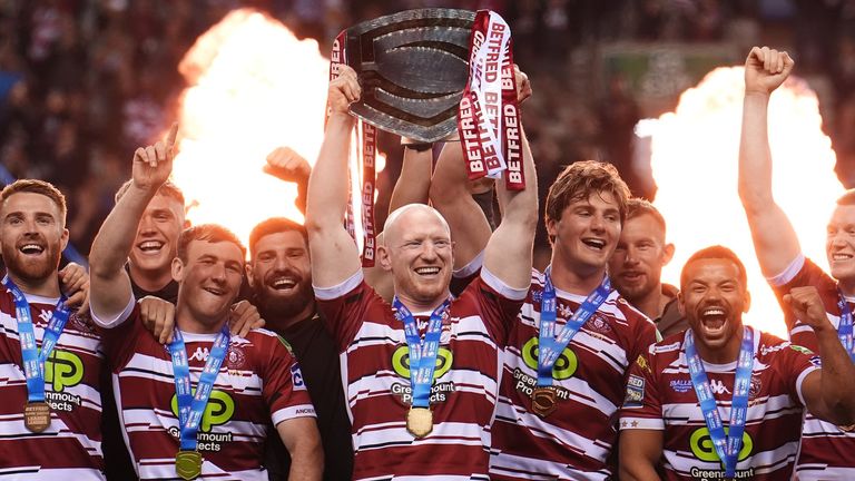 Wigan Warriors v Salford Red Devils - Betfred Super League - The Brick Community Stadium
Wigan Warriors' Liam Farrell with the League Leaders' Shield following the Betfred Super League match at The Brick Community Stadium, Wigan. Picture date: Thursday September 19, 2024.