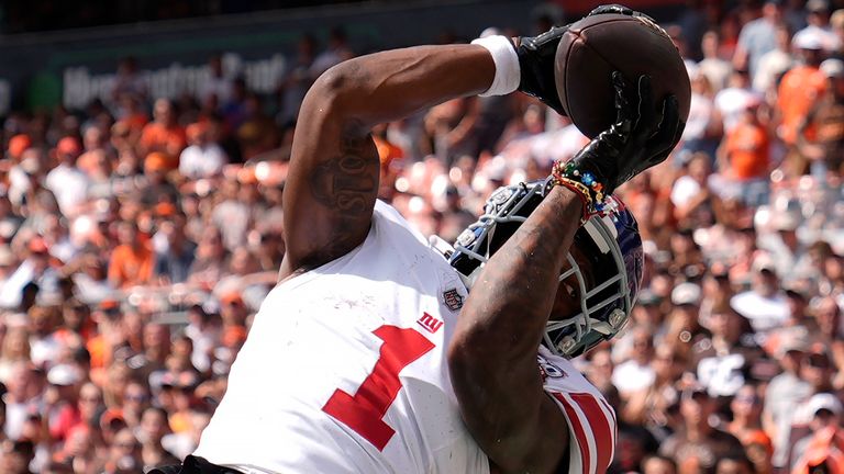 New York Giants wide receiver Malik Nabers (1) catches a touchdown pass against the Cleveland Browns during the first half of an NFL football game, Sunday, Sept. 22, 2024 in Cleveland. (AP Photo/Sue Ogrocki)