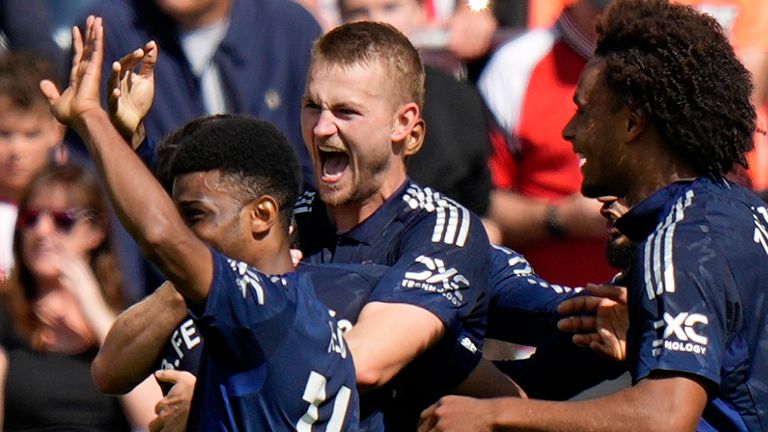 Matthijs de Ligt celebrates after scoring the opening goal (AP Photo/Alastair Grant)