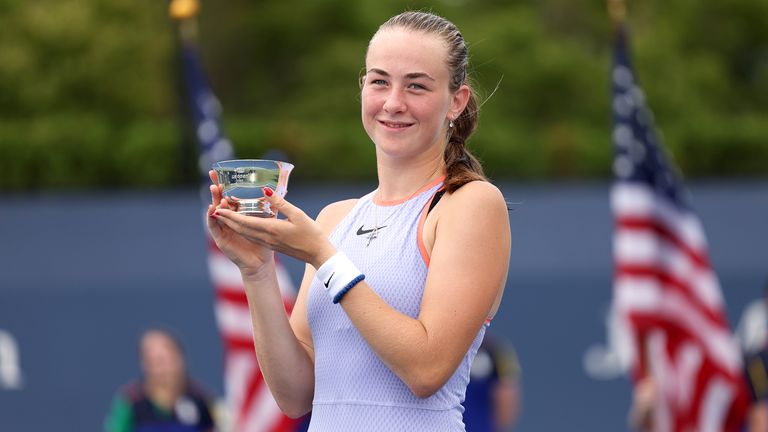 Mika Stojsavljevic of Great Britain celebrates with her trophy after defeating Wakana Sonobe of Japan in their Junior Girls' Singles Final match on Day Thirteen of the 2024 US Open at USTA Billie Jean King National Tennis Center on September 07, 2024 in the Flushing neighborhood of the Queens borough of New York City. (Photo by Luke Hales/Getty Images)