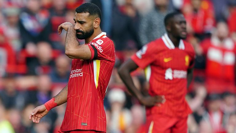 Liverpool's Mohamed Salah looks dejected after they concede