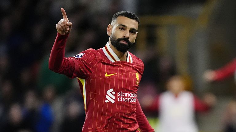 Mohamed Salah celebrates scoring his penalty