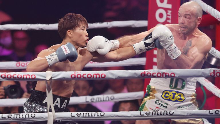 Naoya Inoue (left)...fights TJ Doheny for the undisputed super-bantamweight world championship at the Ariake Arena in Tokyo, Japan on September 3, 2024. Inoue successfully defended his super-bantamweight belts.( The Yomiuri Shimbun via AP Images )