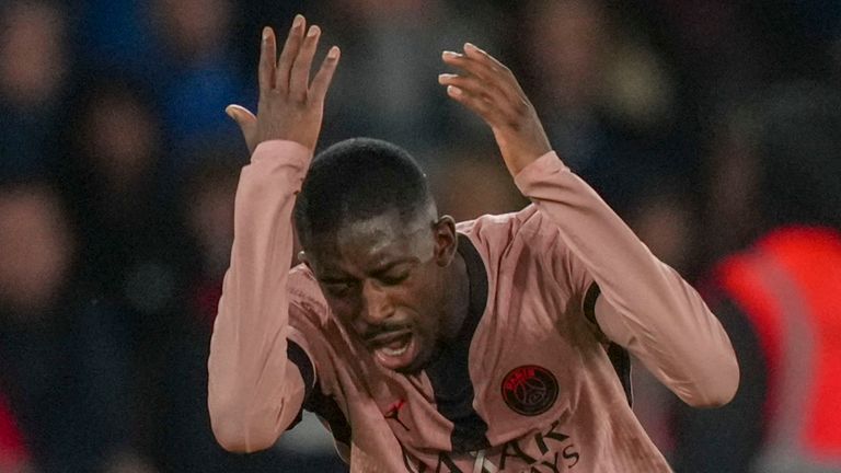 PSG's Ousmane Dembele reacts during the French League One soccer match between Paris Saint-Germain and Rennes at the Parc des Princes in Paris, Friday, Sept. 27, 2024. (AP Photo/Thibault Camus)