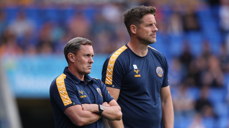 Paul Hurst, pelatih kepala Shrewsbury Town dan Chris Doig, asisten pelatih kepala Shrewsbury Town selama pertandingan persahabatan pramusim antara Shrewsbury Town dan Leicester City di Croud Meadow pada 23 Juli 2024 di Shrewsbury, Inggris.