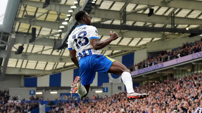 Danny Welbeck leaps in celebration after scoring against Nottingham Forest