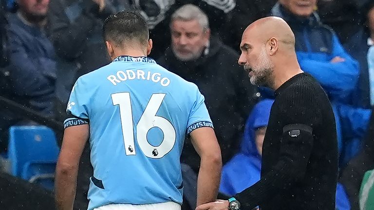 Rodri leaves the field after an injury during the Premier League match between Manchester City and Arsenal