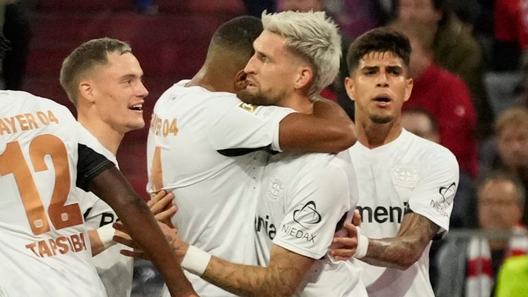 Leverkusen's Robert Andrich (second right) celebrates after scoring the opener (AP Photo/Matthias Schrader)