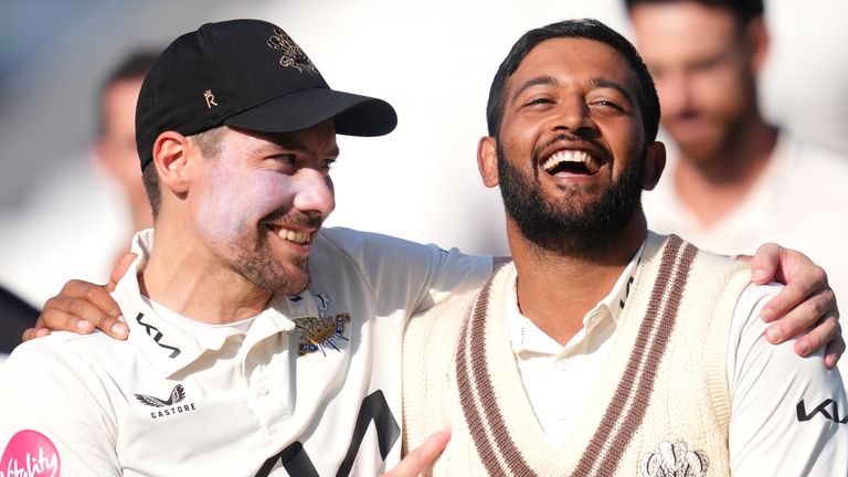 Surrey's Rory Burns (left) and Ryan Patel celebrate victory during day three of the Vitality County Championship at the Kia Oval in London. Image date: Thursday, September 19, 2024.