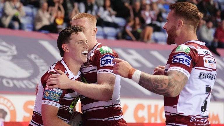 Wigan Warriors v Salford Red Devils - Betfred Super League - The Brick Community Stadium
Wigan Warriors� Jai Field (left) celebrates scoring their side's try of the game during the Betfred Super League match at The Brick Community Stadium, Wigan. Picture date: Thursday September 19, 2024.