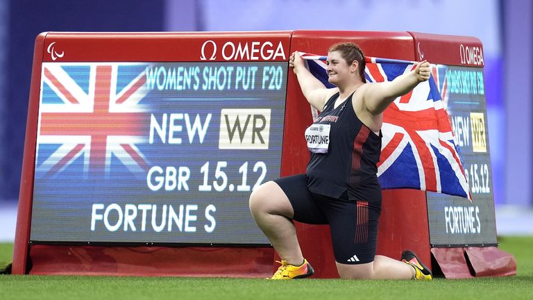 Great Britain's Sabrina Fortune celebrates winning gold and setting a new world record in the Women's Shot Put - F20 Final at the Stade de France