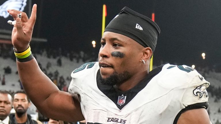 Philadelphia Eagles running back Saquon Barkley (26) leaves to field after their win against the Green Bay Packers in an NFL football game, Saturday, Sept. 7, 2024, at the Neo Quimica Arena in Sao Paulo. (AP Photo/Andre Penner)