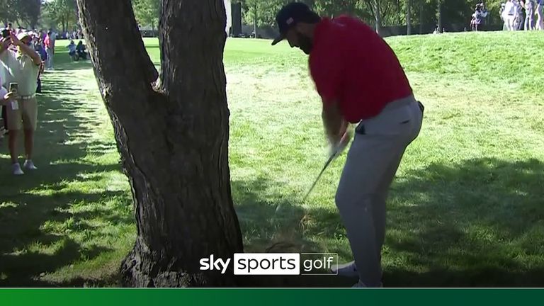 
Scottie Scheffler plays a creative left-handed shot on the fourth to get out of the trees at the Presidents Cup!