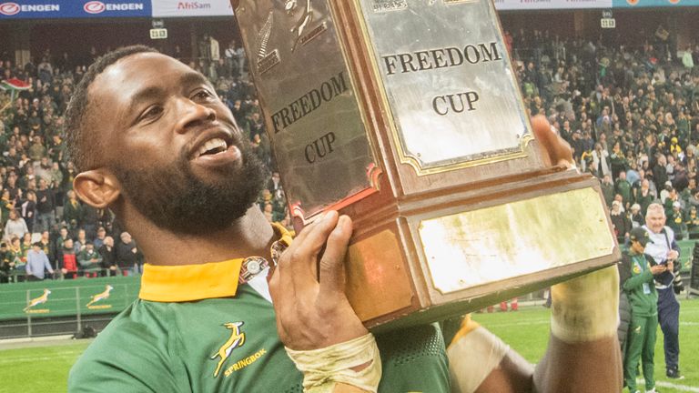 South Africa's captain Siya Kolisi holds the Freedom Cup at the end of the rugby union Championship test match South Africa vs New Zealand at the Cape Town Stadium in Cape Town on September 7, 2024. (Photo by RODGER BOSCH / AFP) 